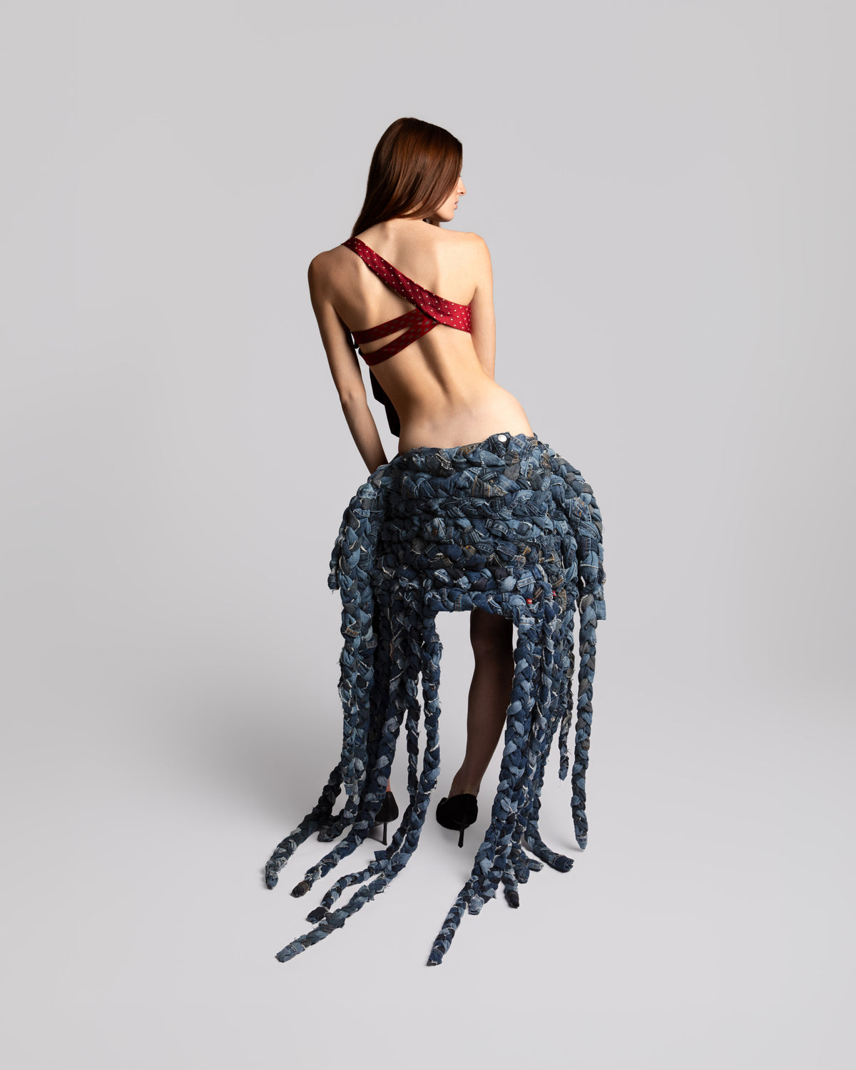 Back view of KROMANOX ART002 Braided Bloom Skirt with hand-braided reconstructed denim
